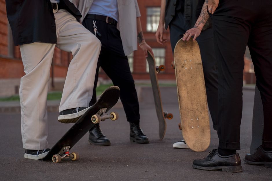 Skaters sharing a coached community session at a skatepark