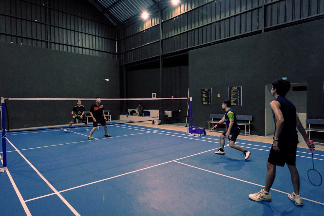 Volleyball team training together indoors