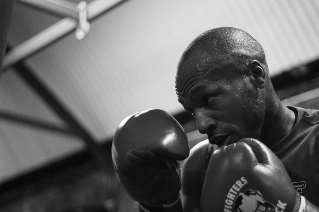 Boxer using the jab to control distance