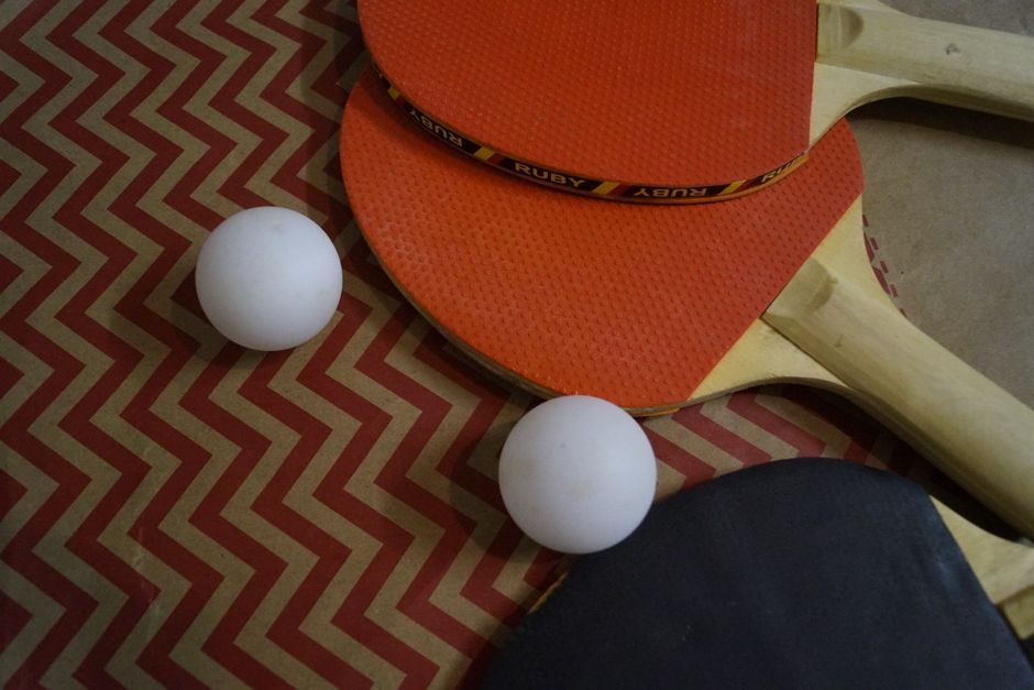 Table tennis player practising controlled spin