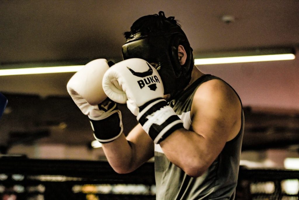 Coach giving technical instructions between boxing rounds