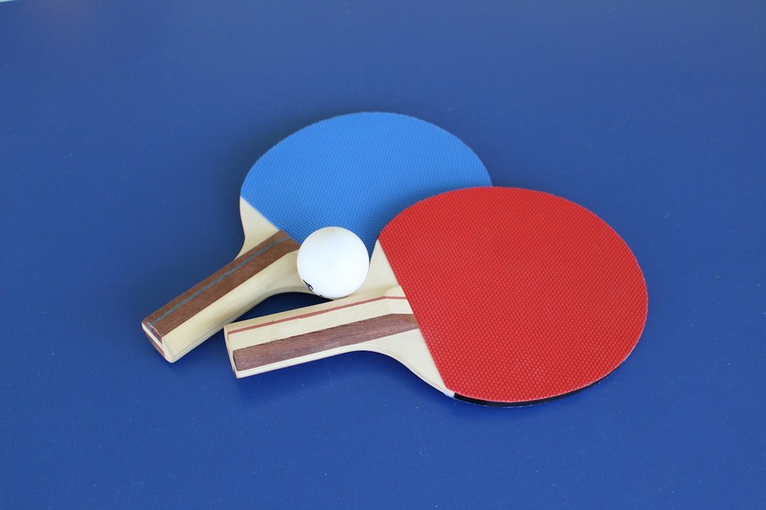 Table tennis player preparing a controlled return