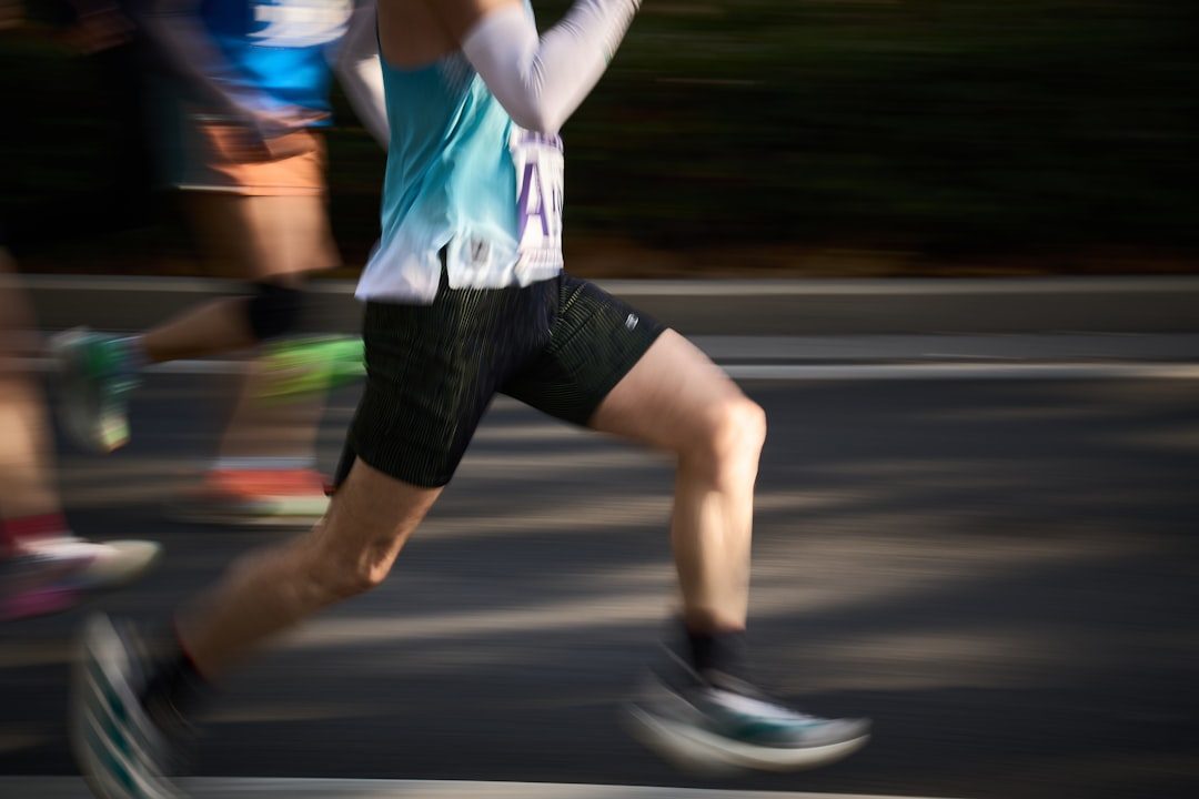 Runner training outdoors with structured endurance coaching