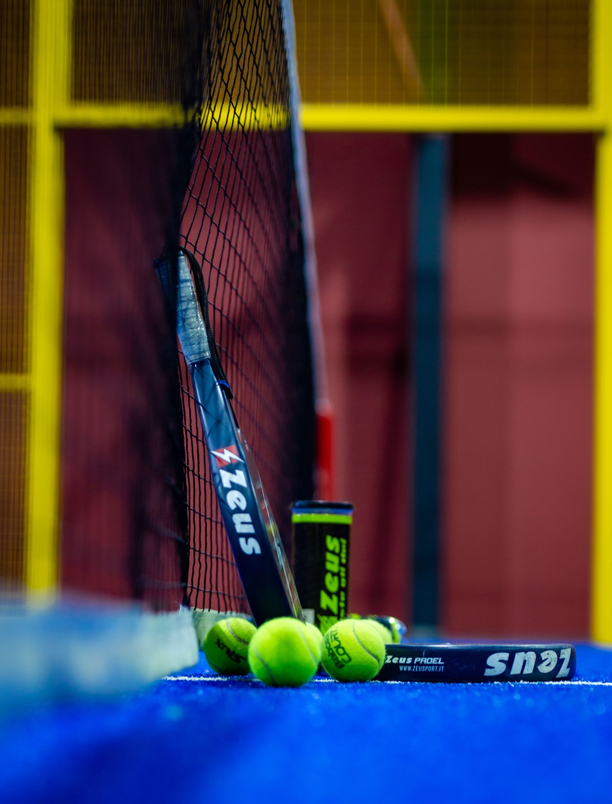 Padel racket and ball prepared for the next rally
