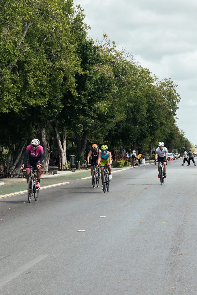 Cyclist enjoying a coffee stop during a club ride