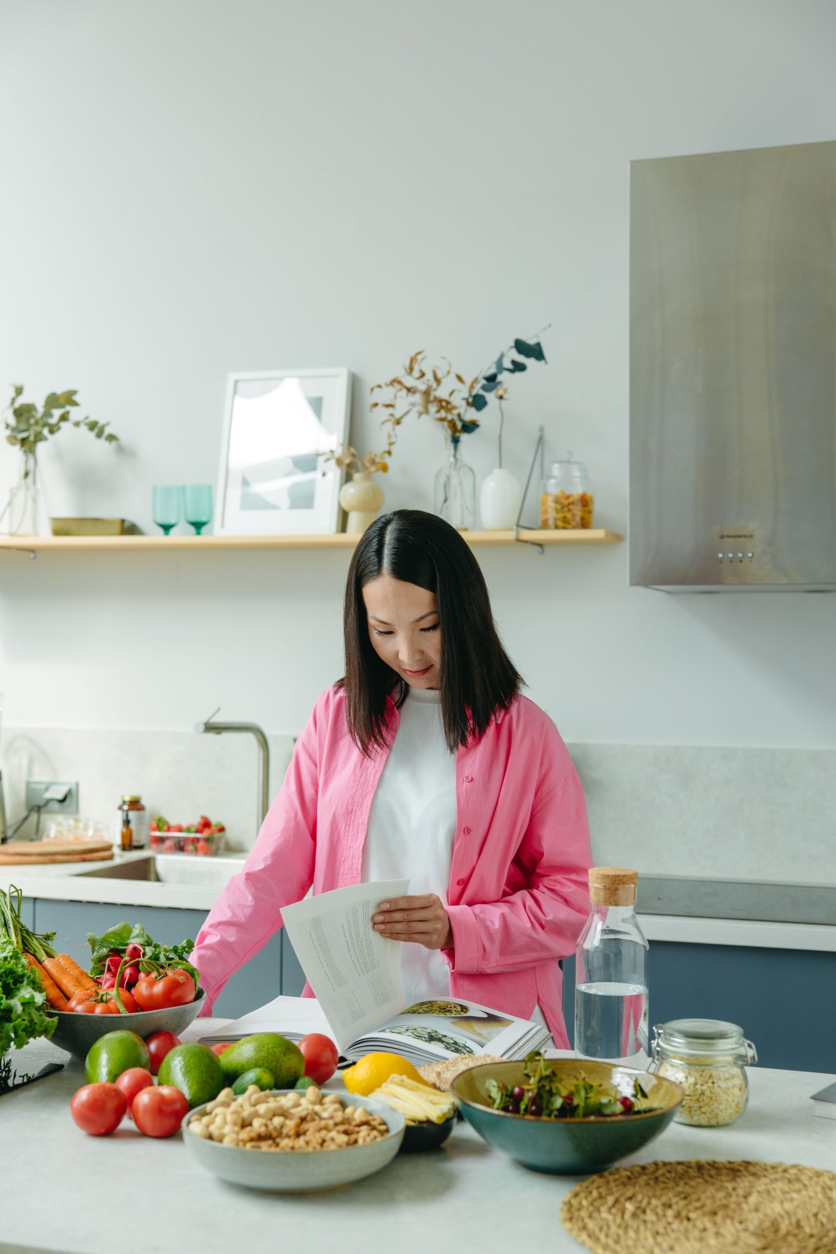 Woman preparing a healthy meal with fresh vegetables