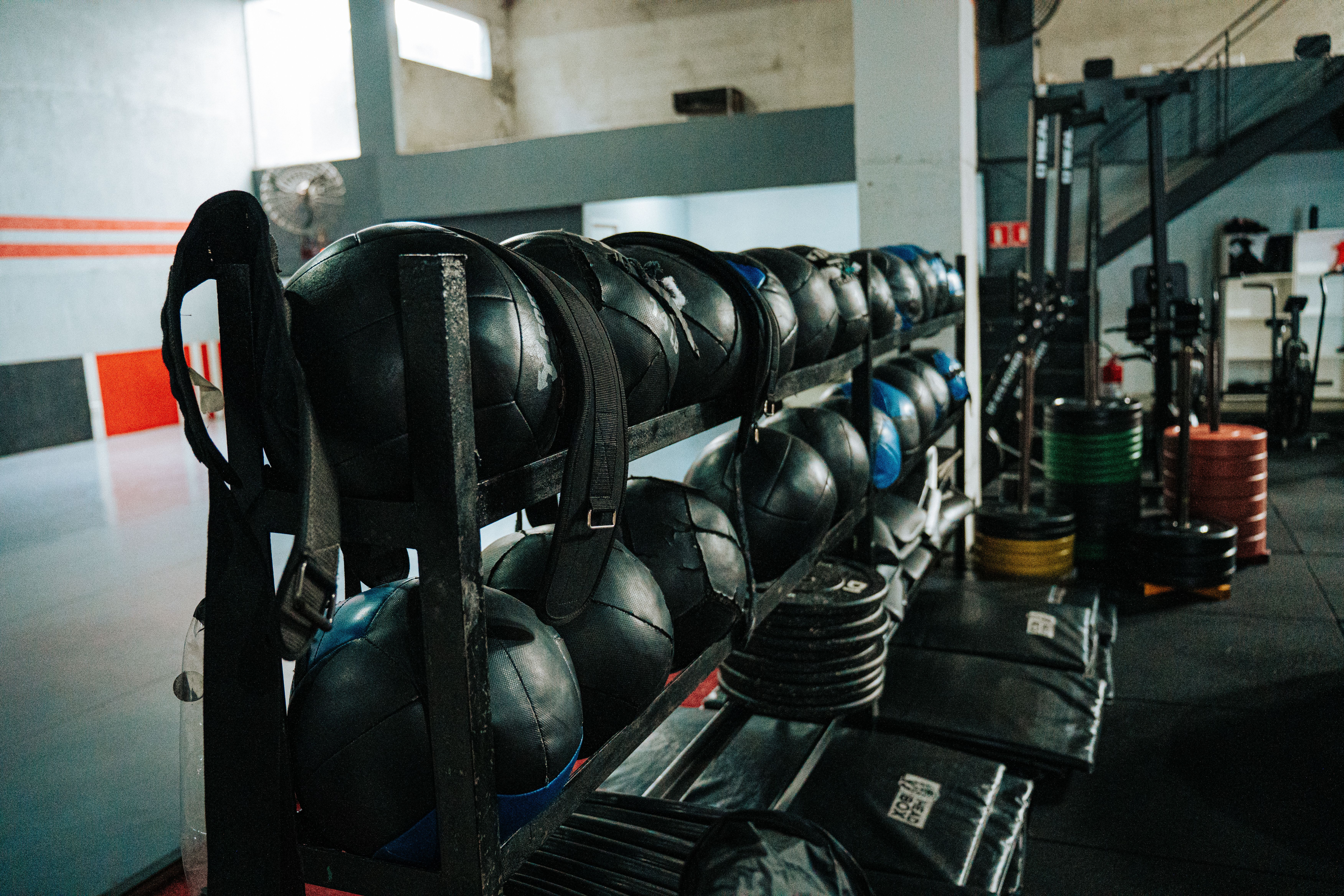 Coach-led group fitness class in a modern gym