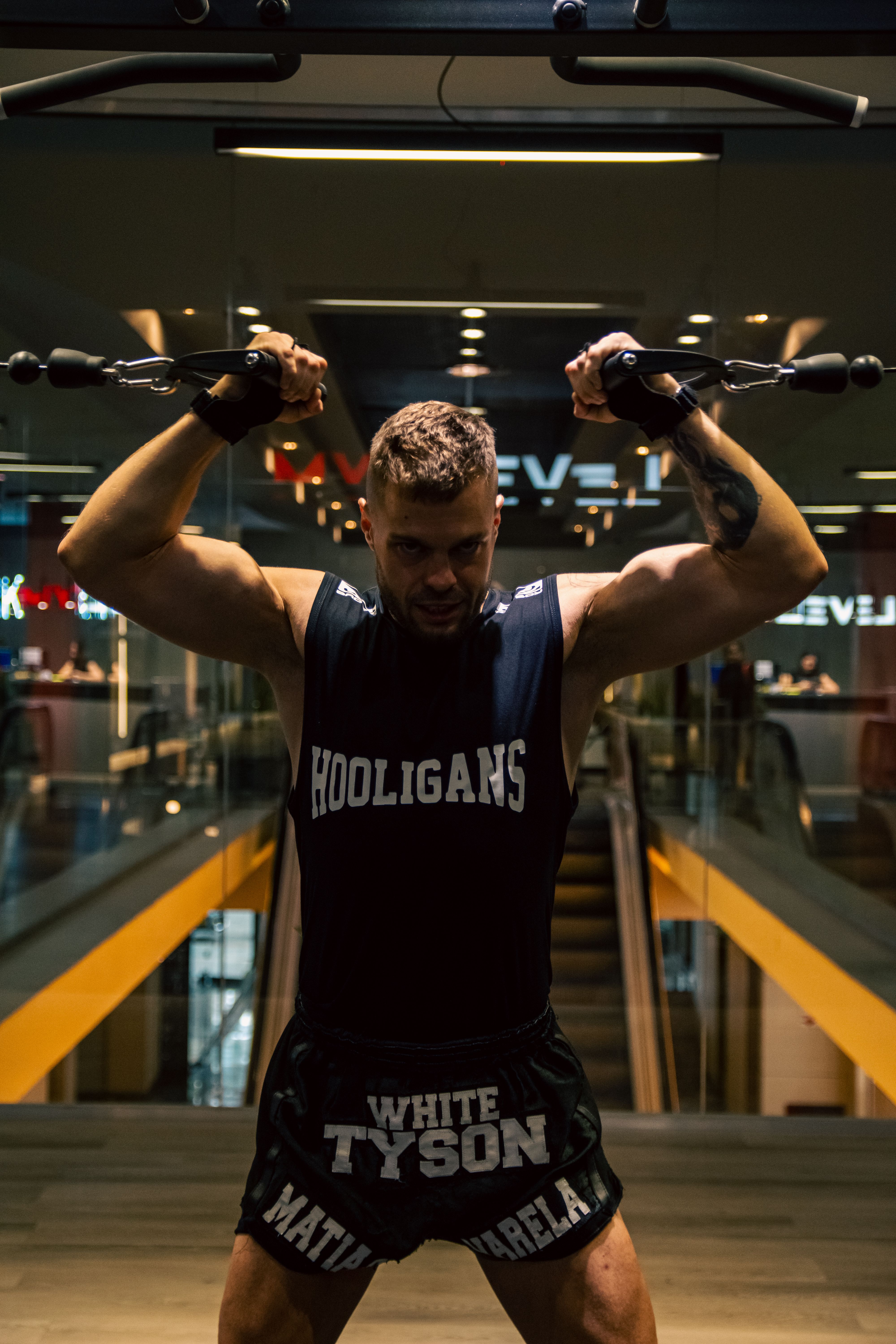 Athlete strength training in the Hercules modern gym demo