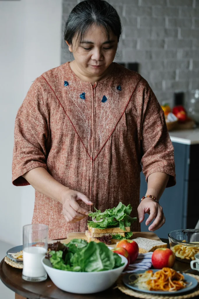 Nutritionist holding broccoli in a professional consultation office