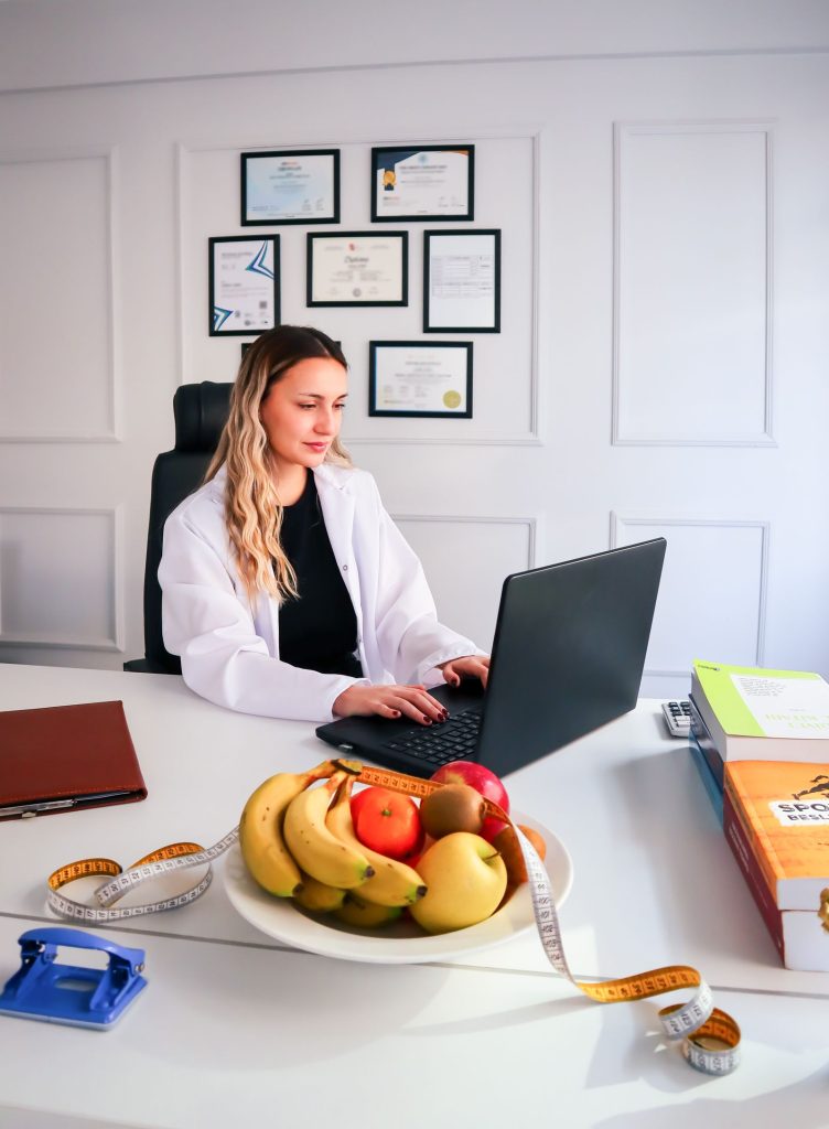 Dietitian preparing fresh vegetables for healthy eating guidance