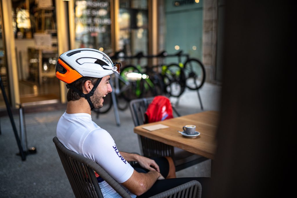 Cycling club members riding together on a weekly road session