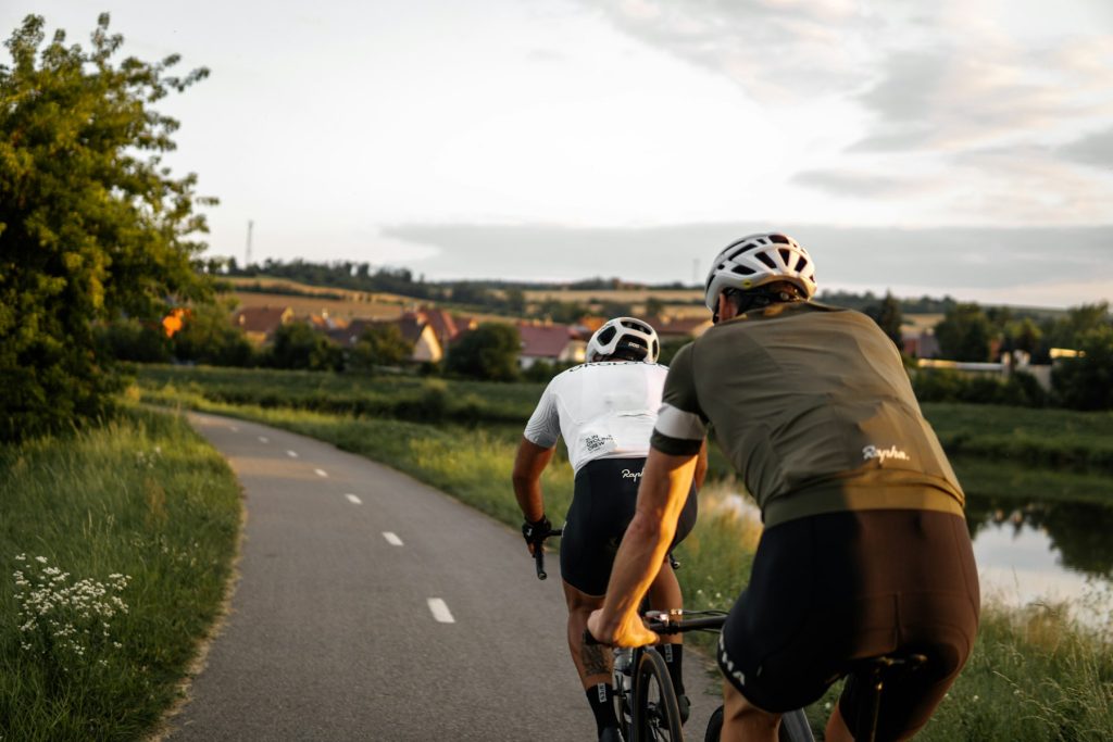 Cyclist receiving recovery support after endurance training