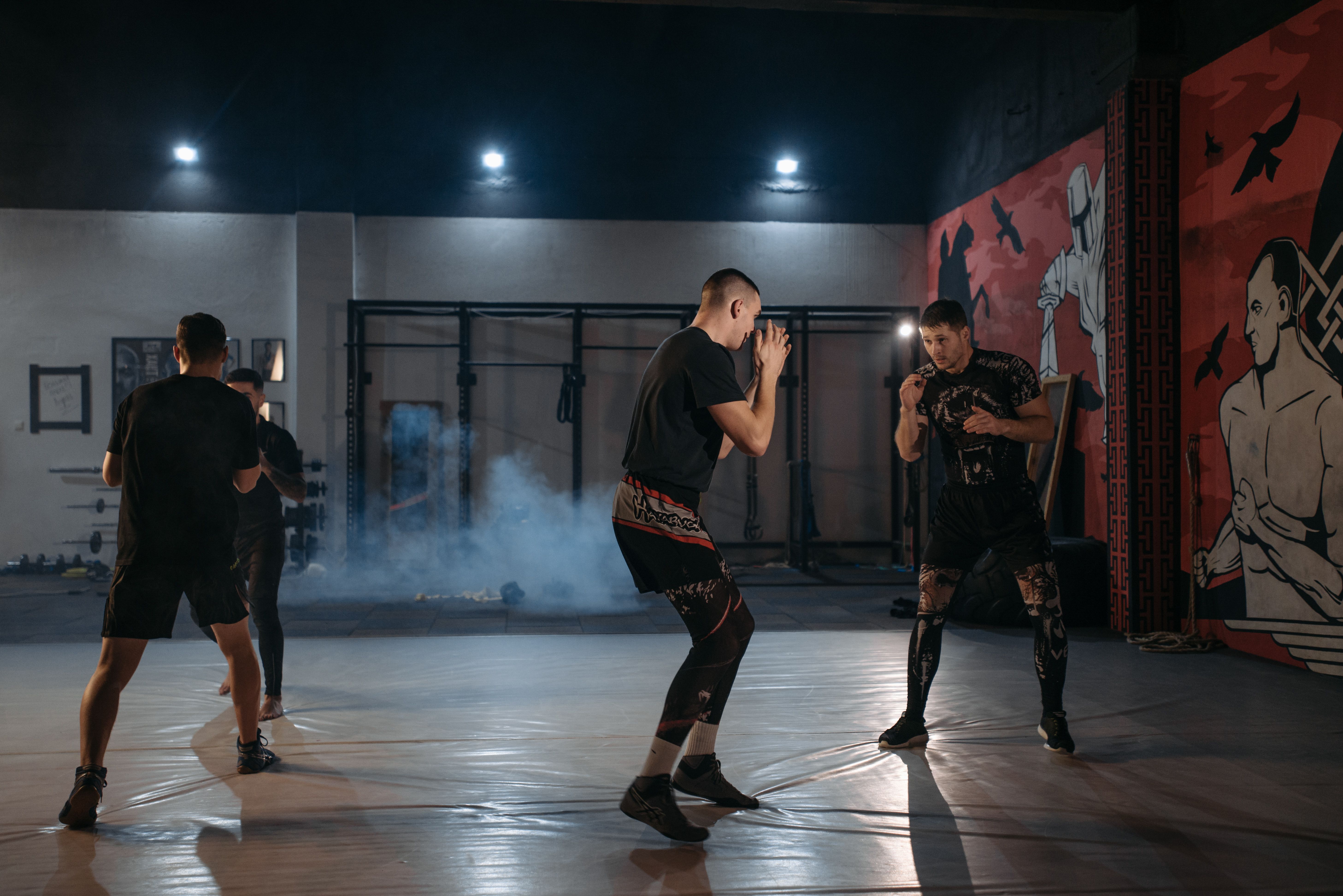 Athlete using professional strength training equipment in a gym