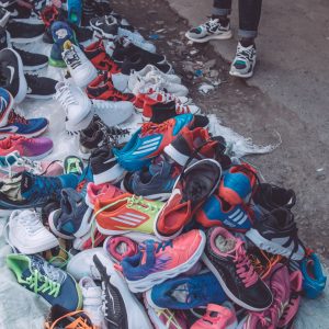 Running Shoes Sports Retail Customer Comparing Equipment Featured