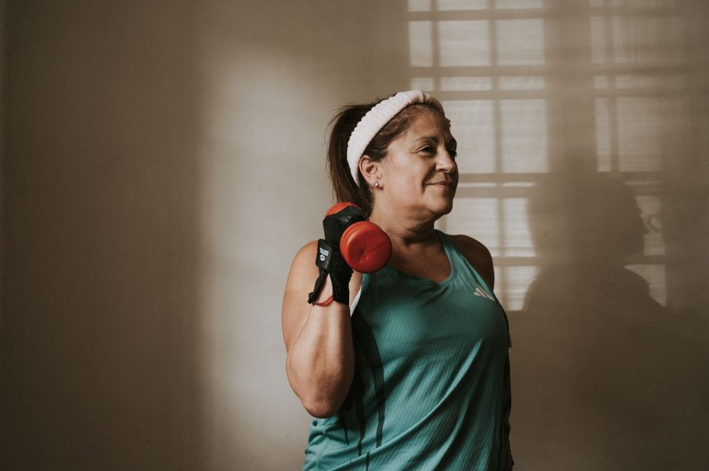 Menopause Strength Gym – middle aged woman lifting weights