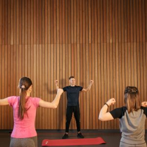 Group fitness class inside a modern gym