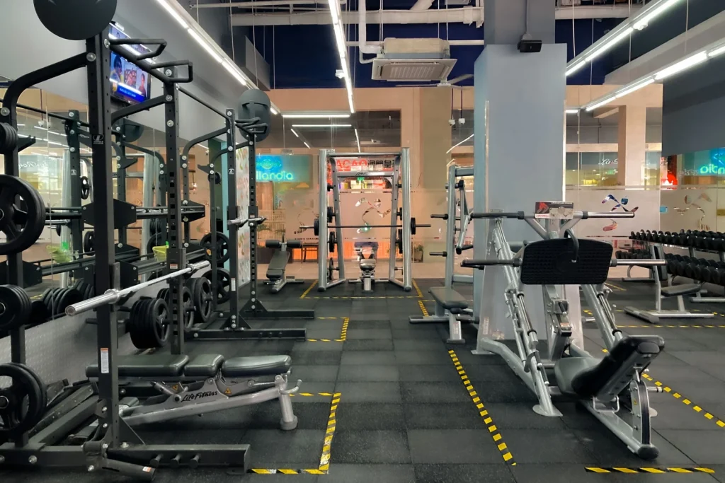 Modern gym floor with professional strength and cardio equipment