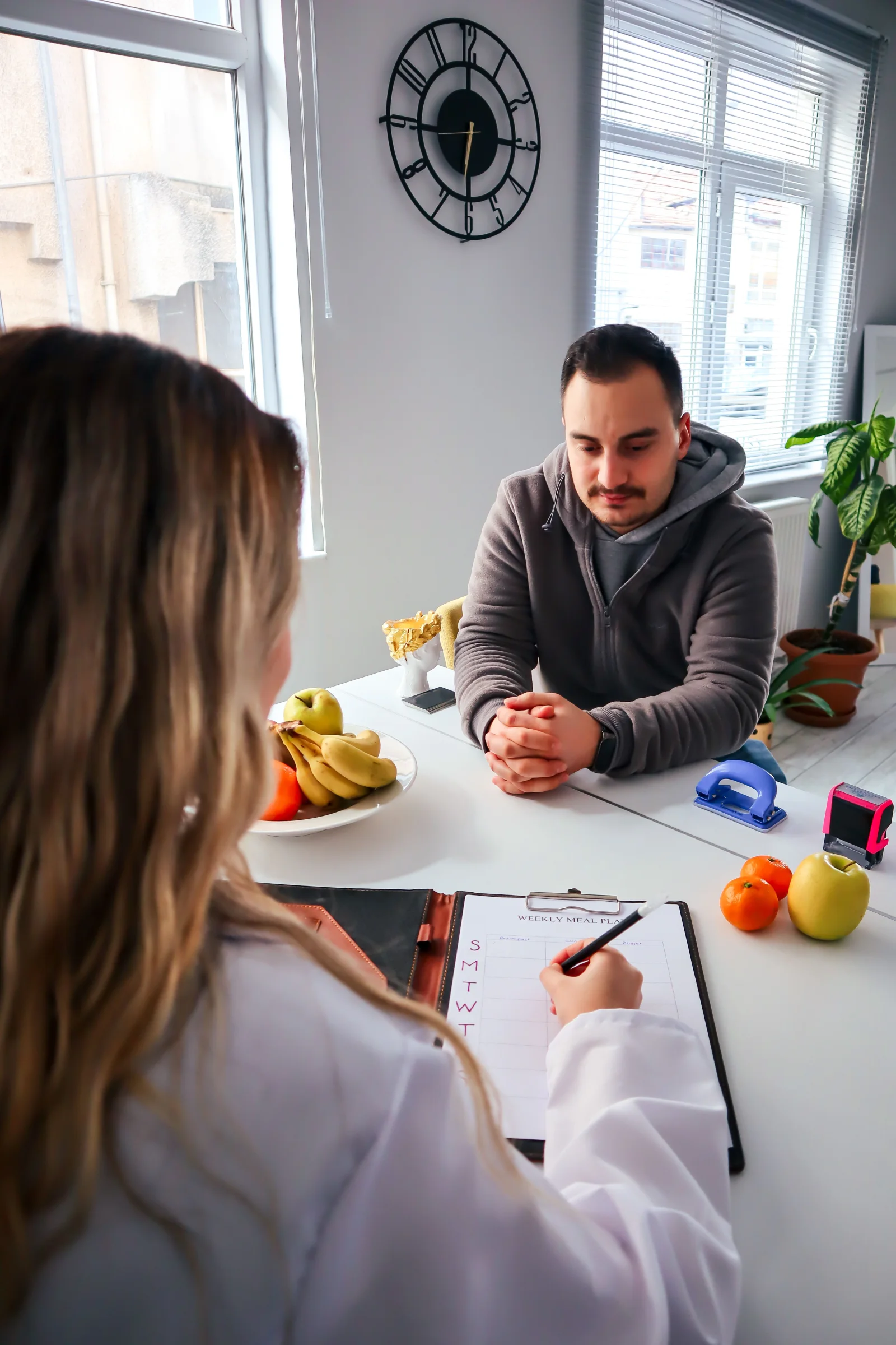 Nutrition consultation appointment with healthy food guidance
