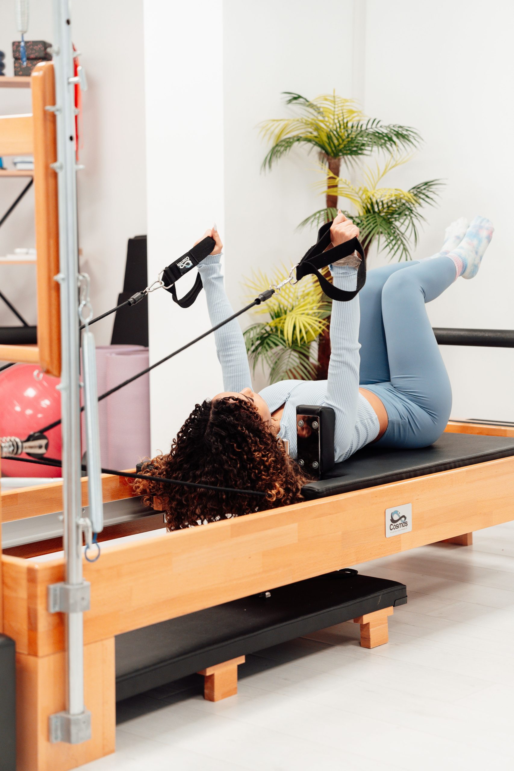 Pilates training inside a modern reformer studio