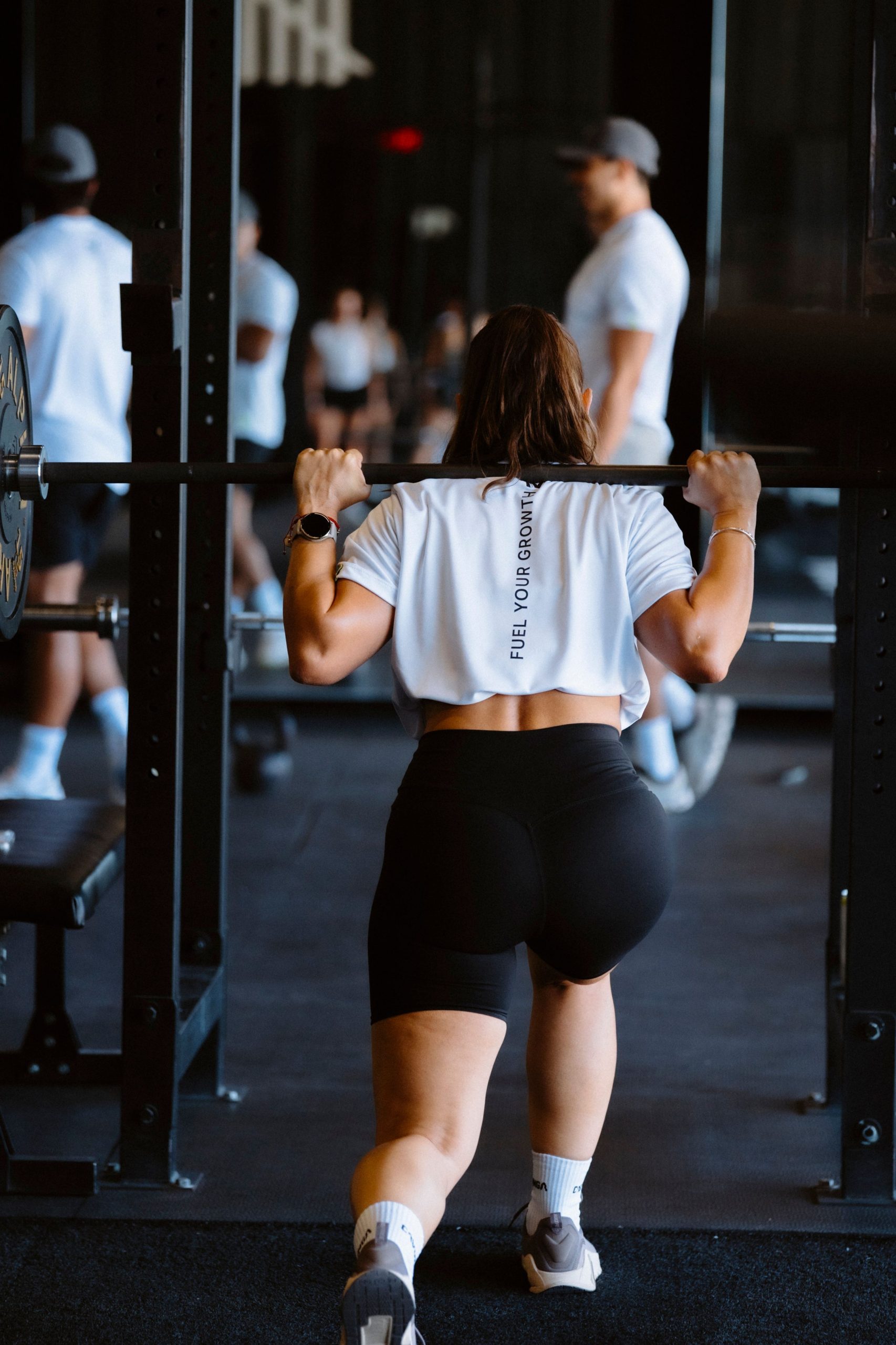 Strength coach with athlete