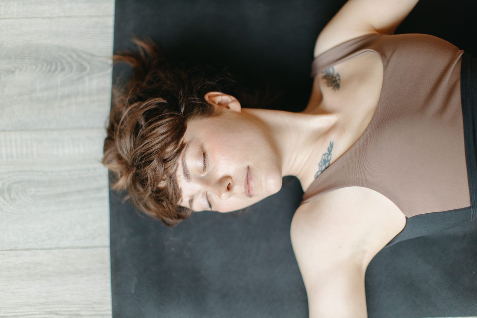 Restorative yoga relaxation on a mat