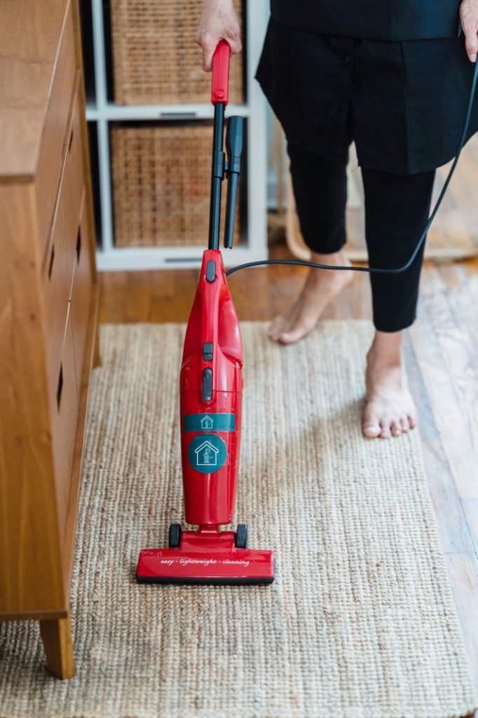 Nexolume Carpet Window Cleaning Person Vacuuming Carpet
