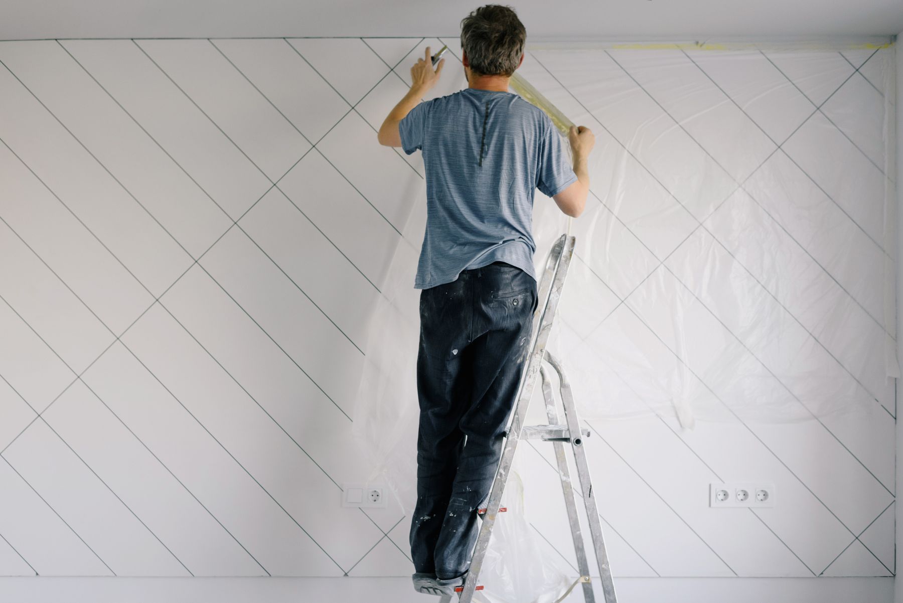Professional painter applying paint