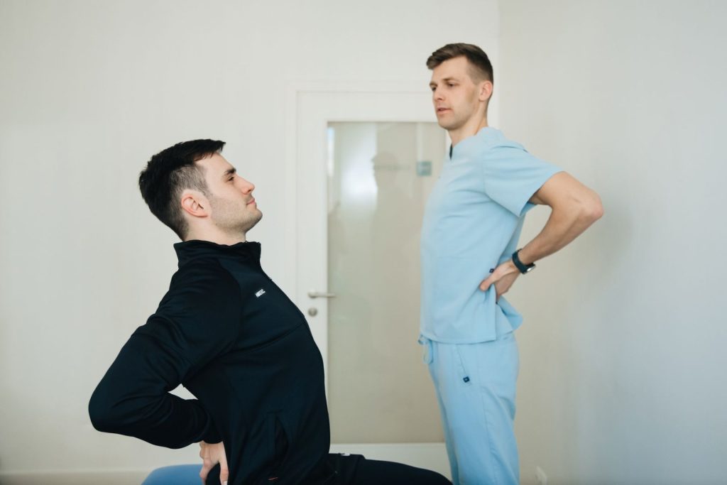 Nexolume Physiotherapy Physiotherapist Instructing Patient