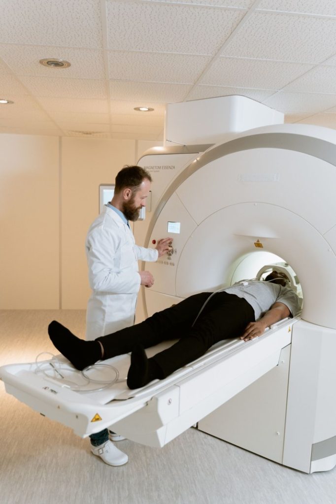Nexolume Radiology Clinic & Diagnostic Imaging doctor operating MRI scanner for patient