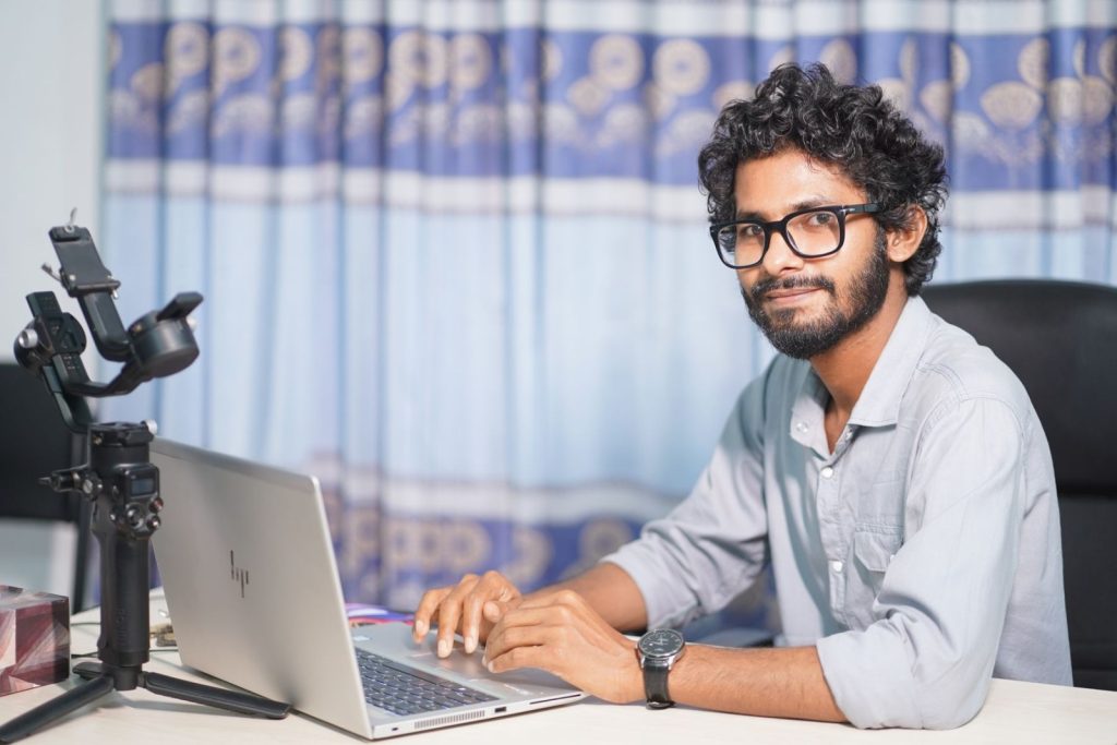 Nexolume SEO, Website Development & Digital Marketing professional web developer working on laptop