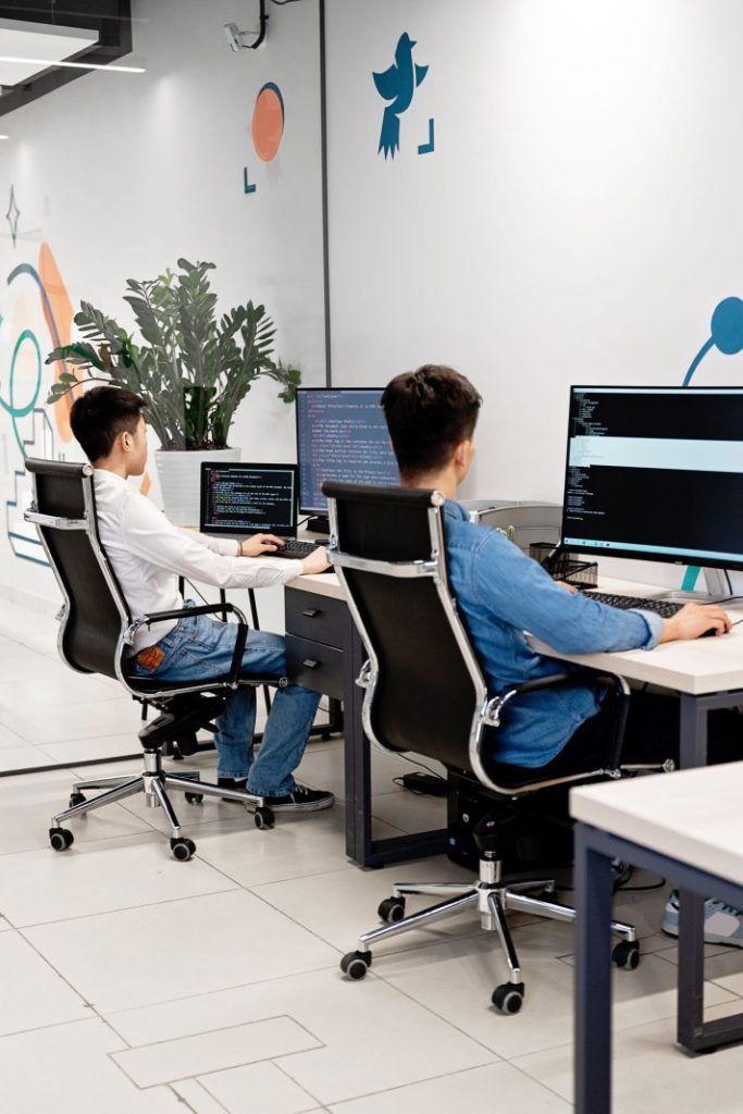 Nexolume Software House & Product Engineering developers collaborating in office