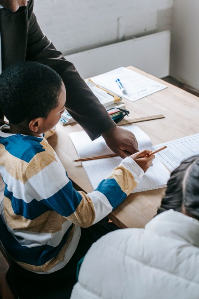 Nexolume Special Schools Teacher Supporting Children Schoolwork