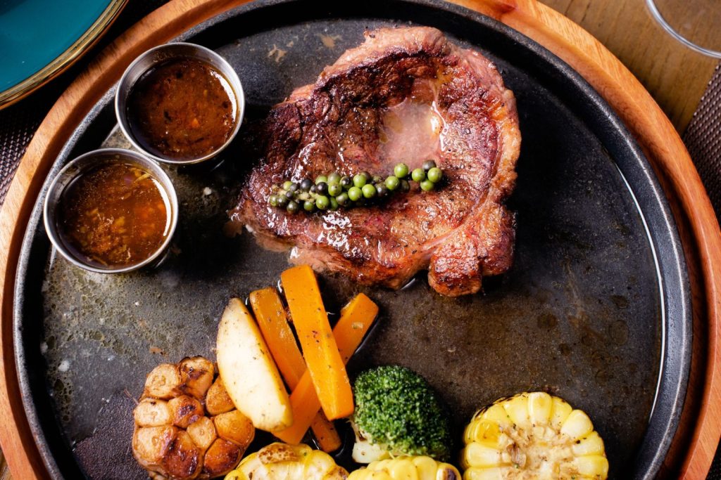 Nexolume Steak House & Grill steak restaurant plate