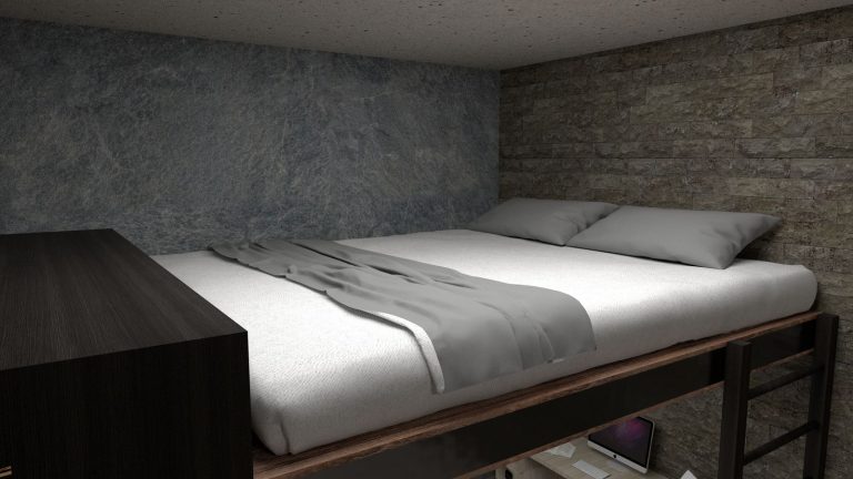 A cozy, minimalist bed with stone wall accent in a modern interior setting.