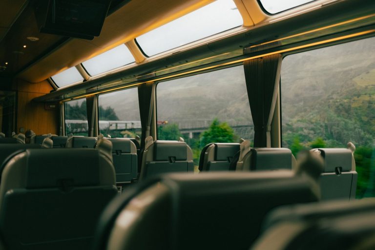 Capture of a scenic journey through Arthur's Pass, New Zealand, seen from a train window.