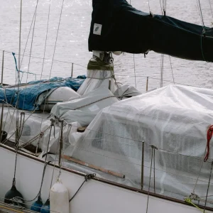 Sailboat in port with deck covered