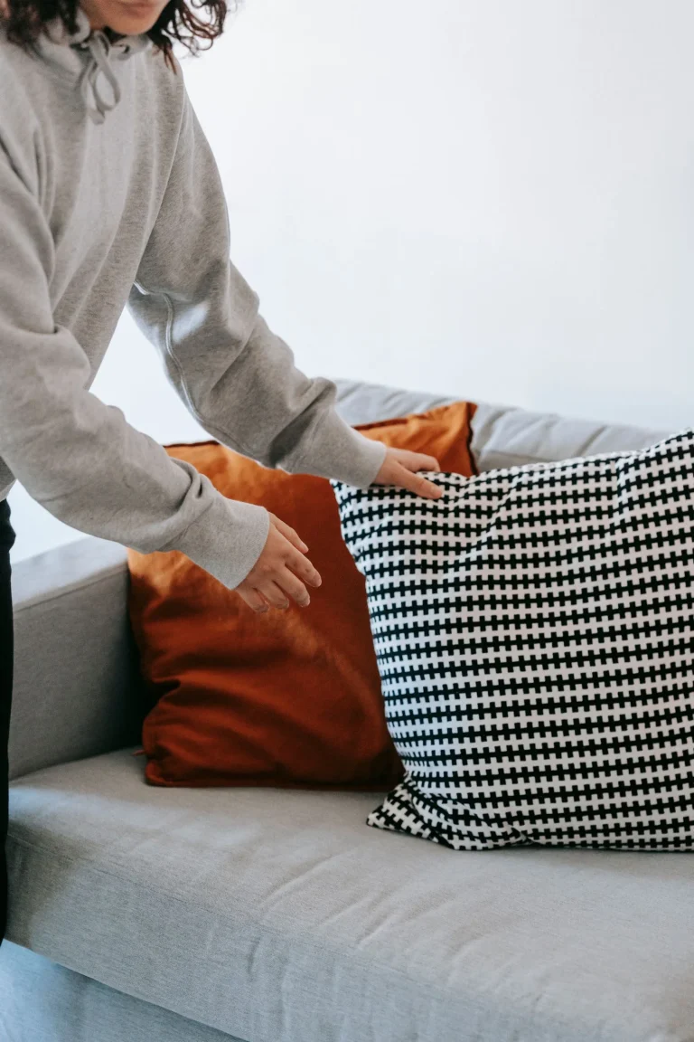 Crop photo of woman holding a throw pillow