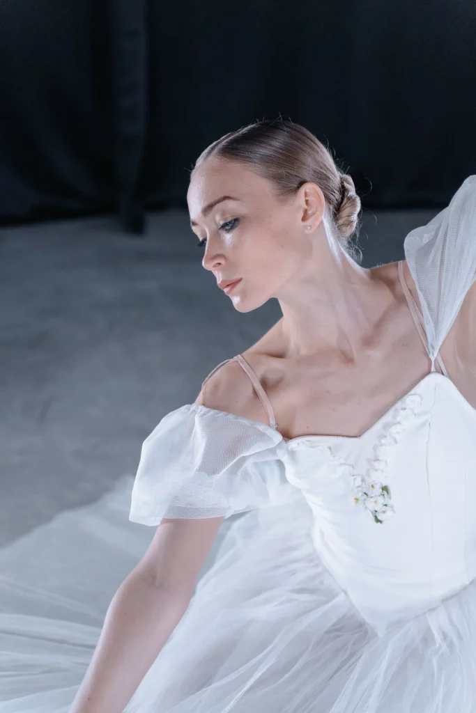 A ballerina in a white dress