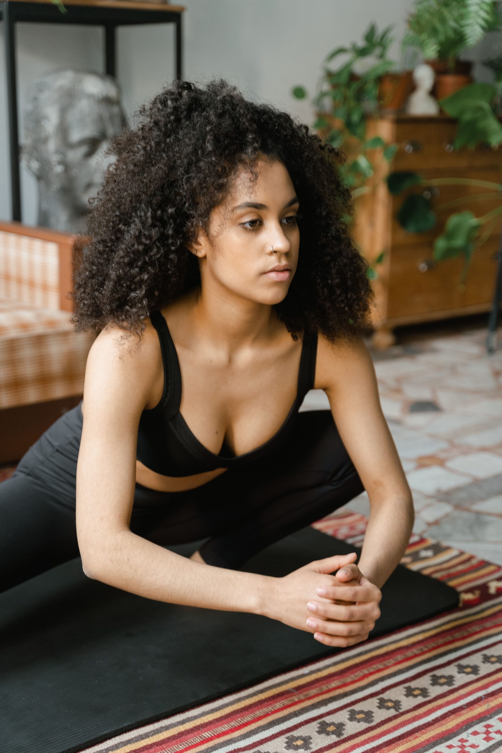 Person practicing yoga at home